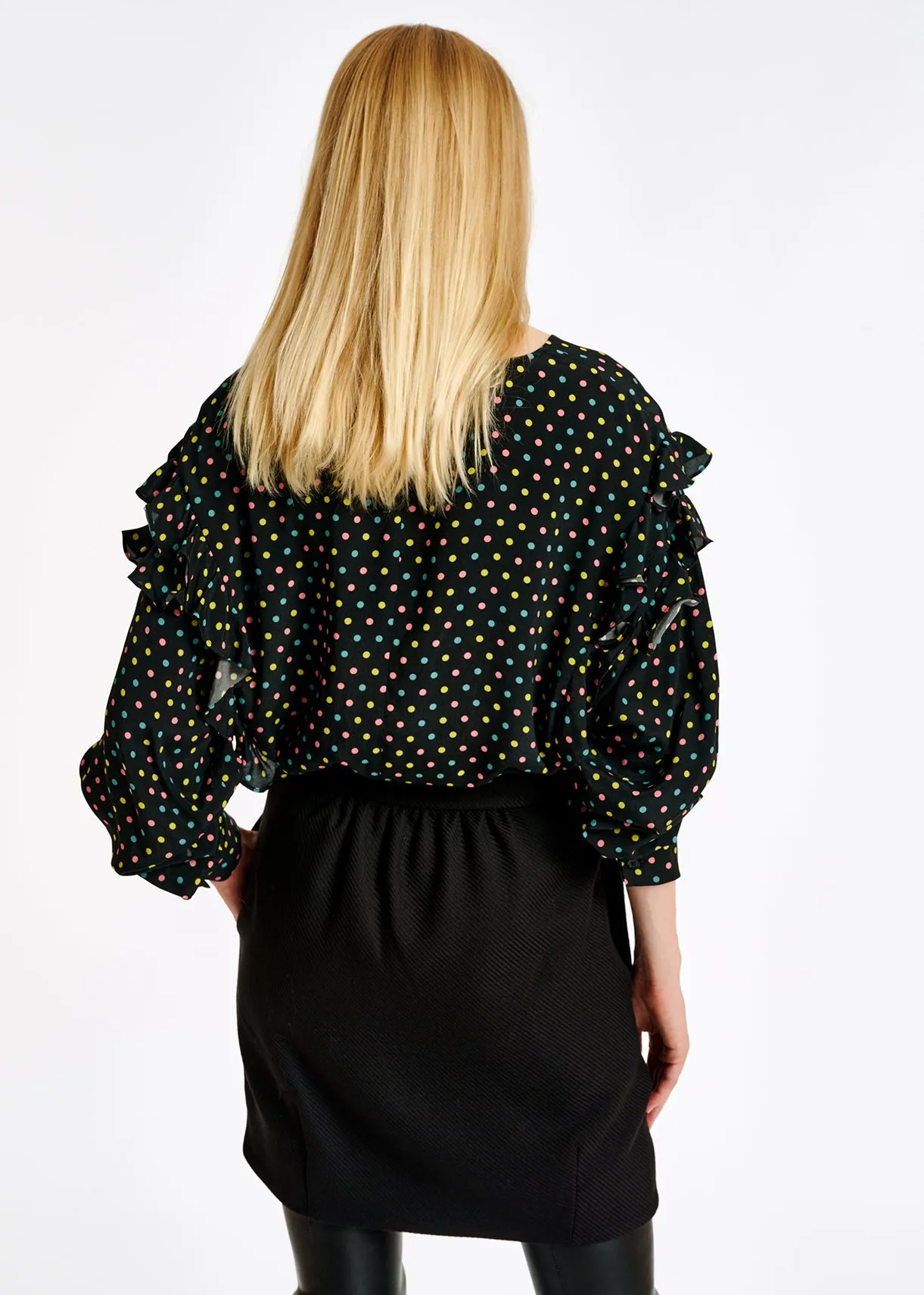 Black polka-dot top with ruffles